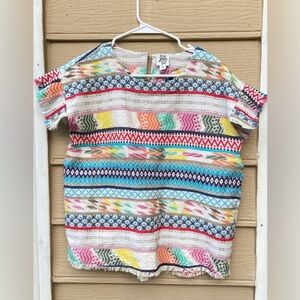 Ivy Jane All Over Embroidered Colorful
Pattern Top with Fringe